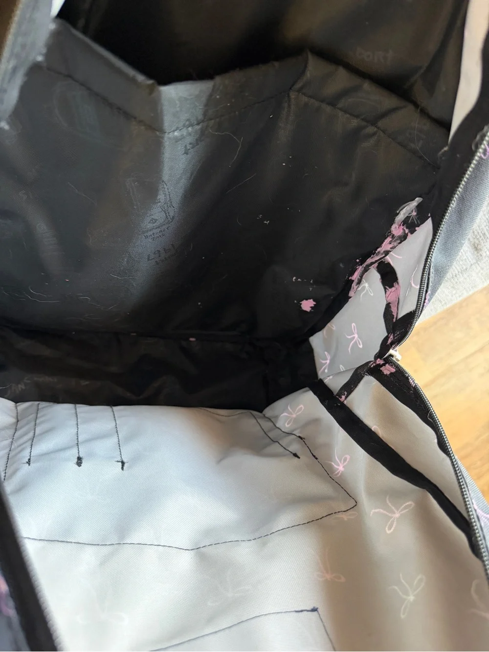 Jansport Black Backpack with Pink Bow Print